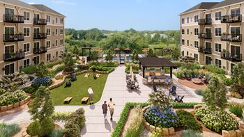 an aerial view of the courtyard at the residences at omni louisville apartmentsat The Carver Apartments, Minnesota, 55318